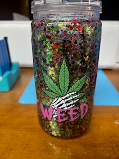 red and gold and green marijuana snow globe cup
